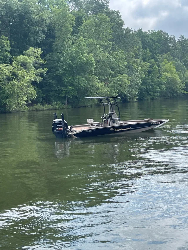 excel boat in water t top black