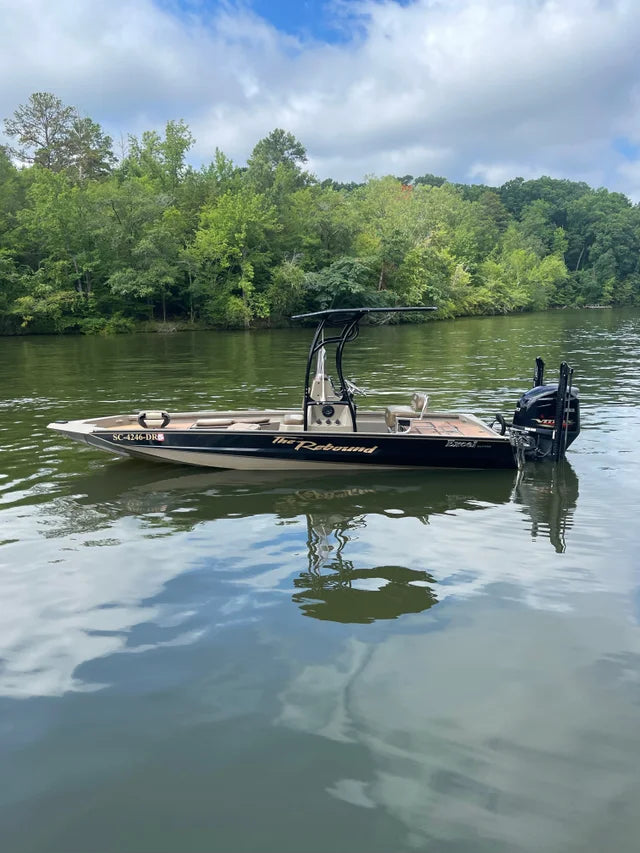 excel boat t top black in water
