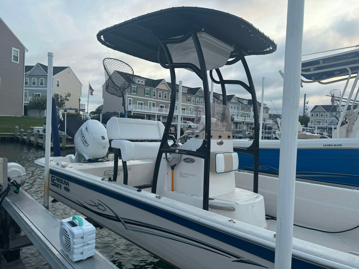 carolina skiff center console boat black t top